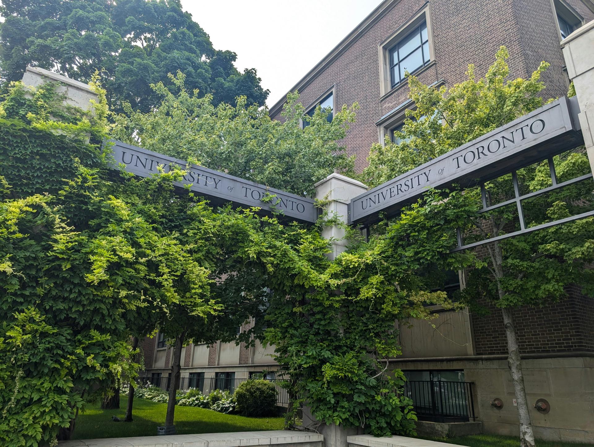 Study in Canada - University of Toronto campus with historic stone buildings and green lawns for Indian students